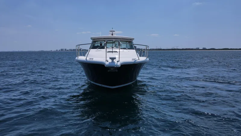 Slide: The Image of 2005 Tiara Yachts 3800 Open cruising on open water. - 2