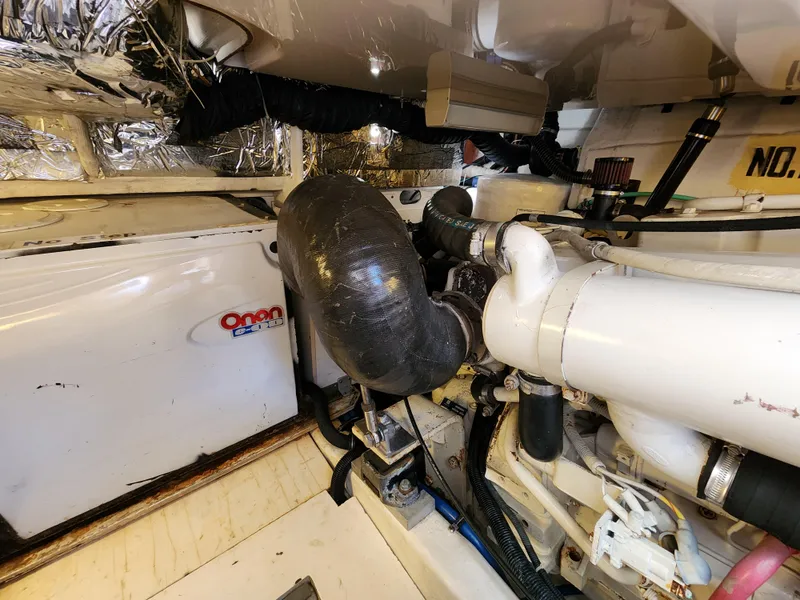 Slide: The Image of Engine room of a 2005 Tiara Yachts 3800 Open with Onan generator. - 34