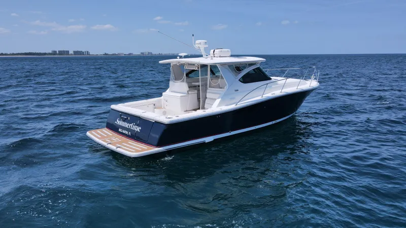 Slide: The Image of 2005 Tiara Yachts 3800 Open cruising on the ocean. - 6
