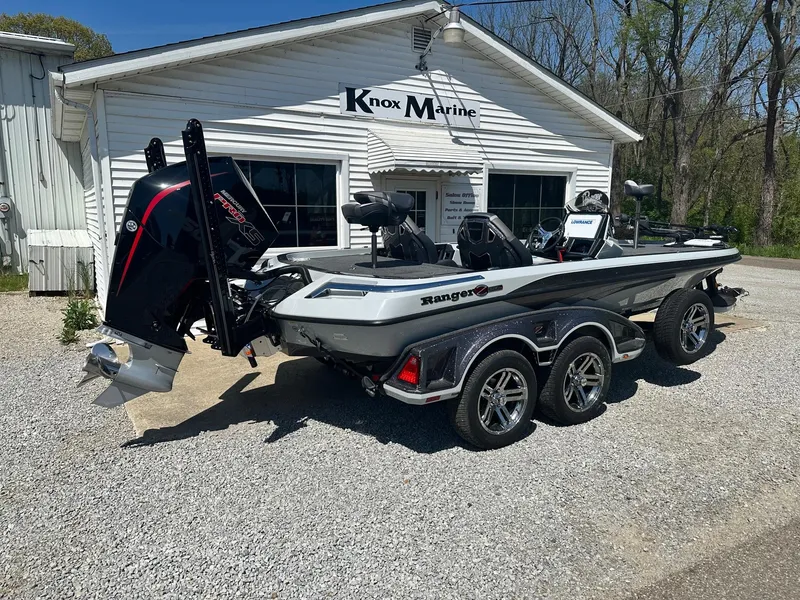 Slide: The Image of 2023 Ranger Z520R boat parked outside Knox Marine. - 2