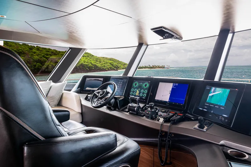Slide: The Image of Luxurious 2021 Princess X95 yacht cockpit with advanced navigation systems and ocean view. - 24