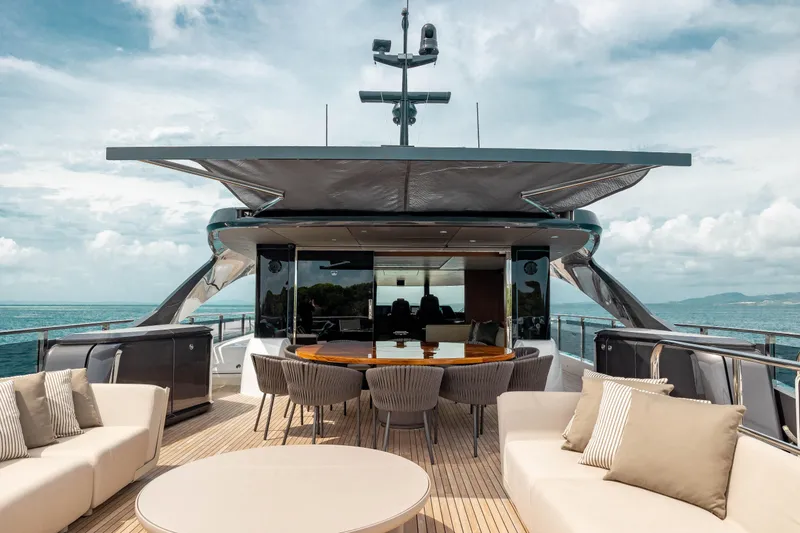 Slide: The Image of Luxurious 2021 Princess X95 yacht deck with elegant seating and ocean view. - 28