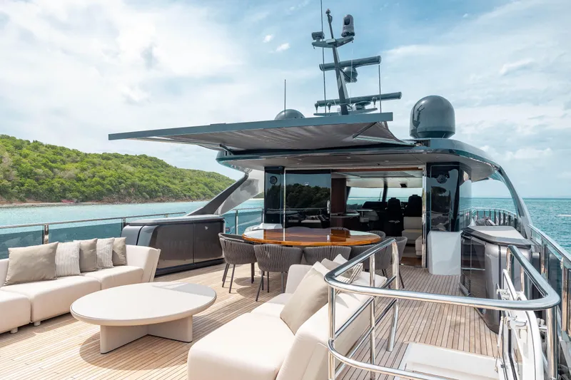 Slide: The Image of Luxurious 2021 Princess X95 yacht deck with elegant seating and ocean view. - 29