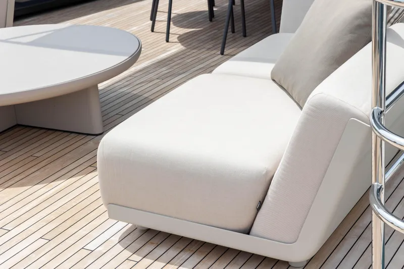 Slide: The Image of Luxurious deck seating on 2021 Princess X95 yacht with modern design and wooden flooring. - 32