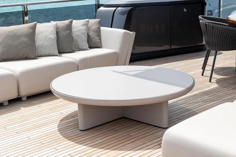 Slide: The Image of Luxurious Princess X95 yacht deck with modern seating and round table, 2021 model. - 34