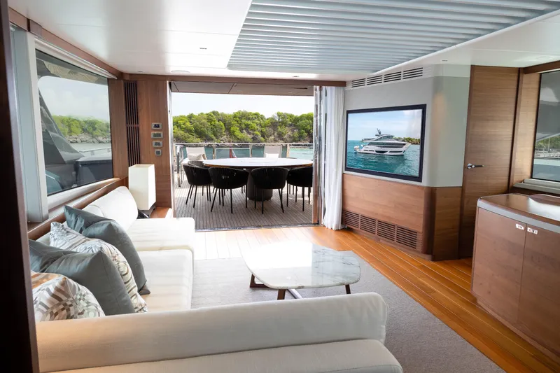 Slide: The Image of Luxurious interior of 2021 Princess X95 yacht with elegant seating and ocean view. - 37