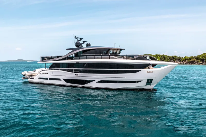 Slide: The Image of Luxury 2021 Princess X95 yacht cruising on clear blue waters. - 6
