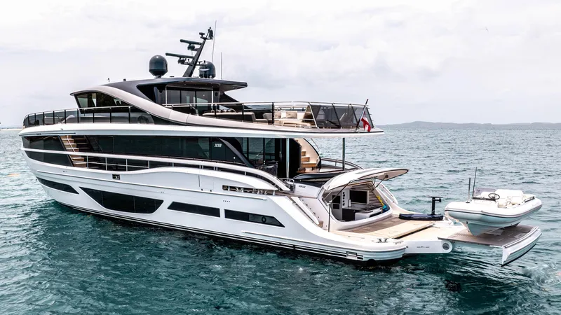 Slide: The Image of Luxurious 2021 Princess X95 yacht on open water, featuring sleek design and spacious decks. - 9