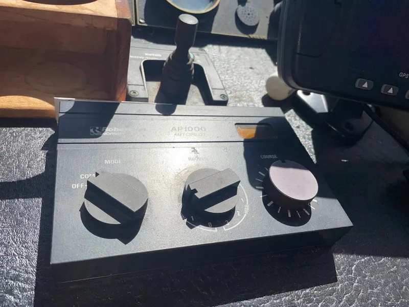 Slide: The Image of Control panel of a 1985 Nord West 900 boat in sunlight. - 18