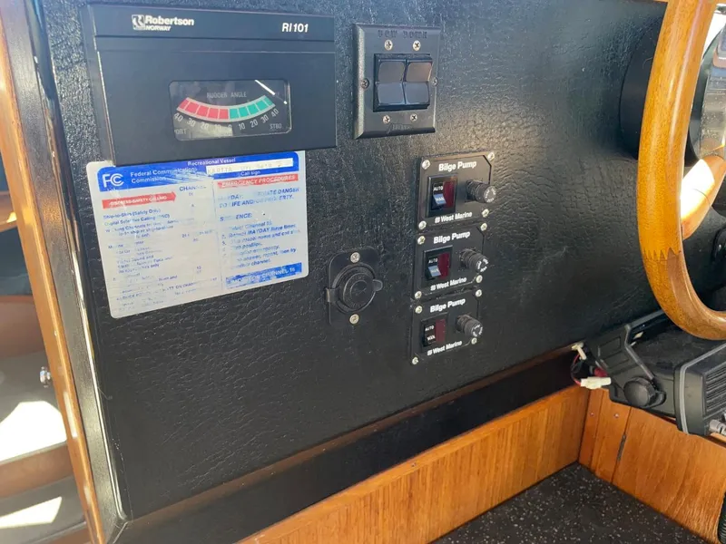 Slide: The Image of Control panel of a 1985 Nord West 900 boat with bilge pump switches. - 19