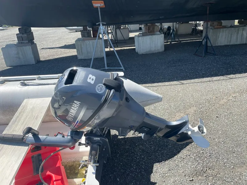 Slide: The Image of Yamaha outboard motor on a Nord West 900 boat, 1985 model, in a boatyard. - 39