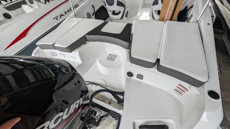 Slide: The Image of 2023 Tahoe 185 S boat interior with Mercury outboard motor. - 5