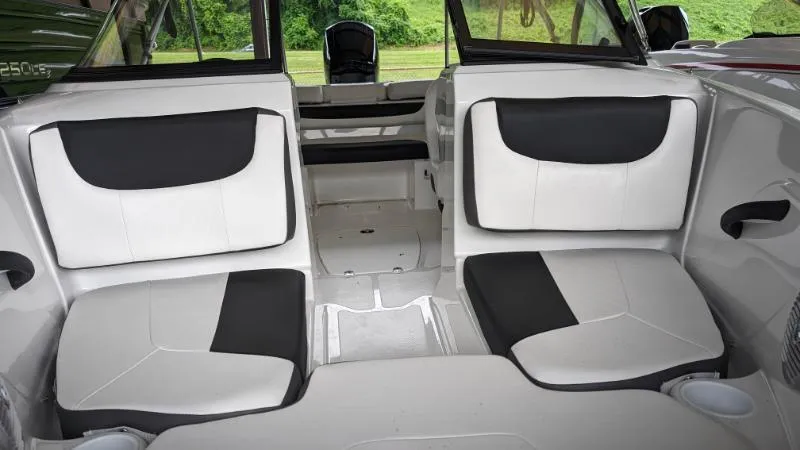 Slide: The Image of 2023 Tahoe 185 S boat interior with black and white seating. - 7
