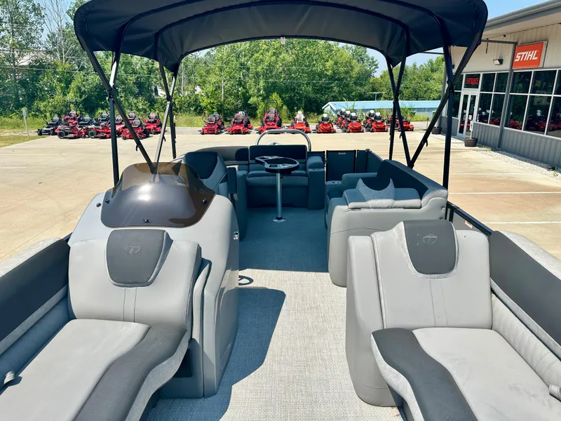 Slide: The Image of 2023 Tahoe Pontoon Cascade Cruise 23 FT Triple 25, spacious interior, comfortable seating, outdoor showroom. - 3