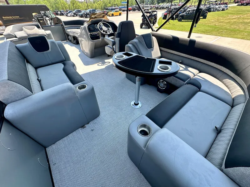 Slide: The Image of 2023 Tahoe Pontoon Cascade Cruise 23 FT Triple 25 interior with luxurious seating and table. - 4