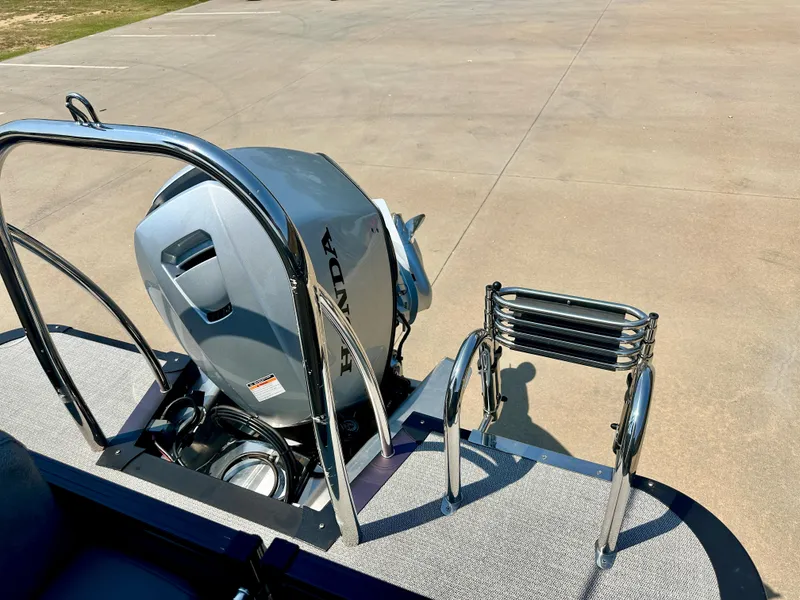 Slide: The Image of 2023 Tahoe Pontoon Cascade Cruise 23 FT Triple 25 with Honda outboard motor and boarding ladder. - 5