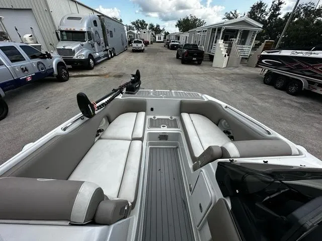 Slide: The Image of 2019 Crownline 205XS boat interior with seating and storage compartments. - 10