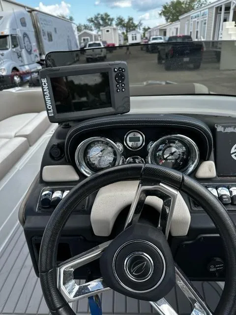 Slide: The Image of 2019 Crownline 205XS boat dashboard with Lowrance navigation system. - 9