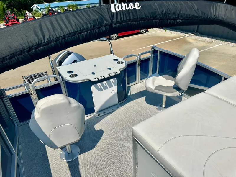 Slide: The Image of 2023 Tahoe Pontoon 23 FT Cascade Rear Fish Triple 25 interior with seating and fishing station. - 8