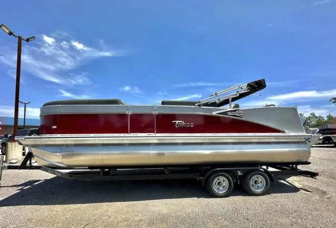Slide: The Image of 2023 Tahoe Pontoon Cascade Versatile Rear Bench 23 FT on trailer, side view. - 1