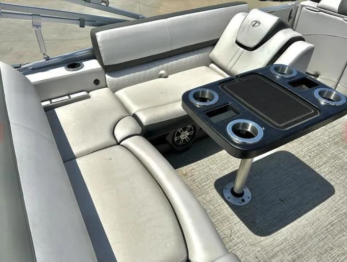 Slide: The Image of 2023 Tahoe Pontoon Cascade Versatile Rear Bench 23 FT with table and cup holders. - 3