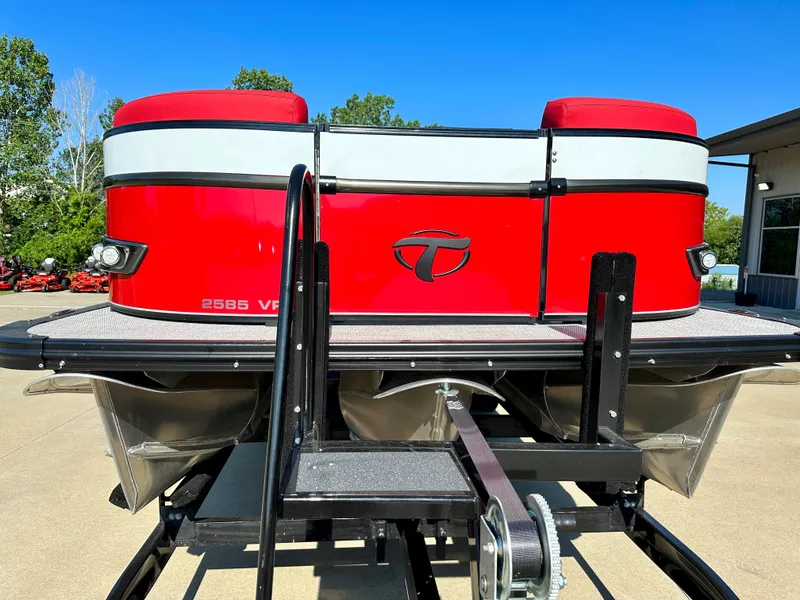Slide: The Image of 2023 Tahoe Pontoon Cascade Versatile Rear Bench 25 FT Triple 25 SP, red and white, on trailer. - 6