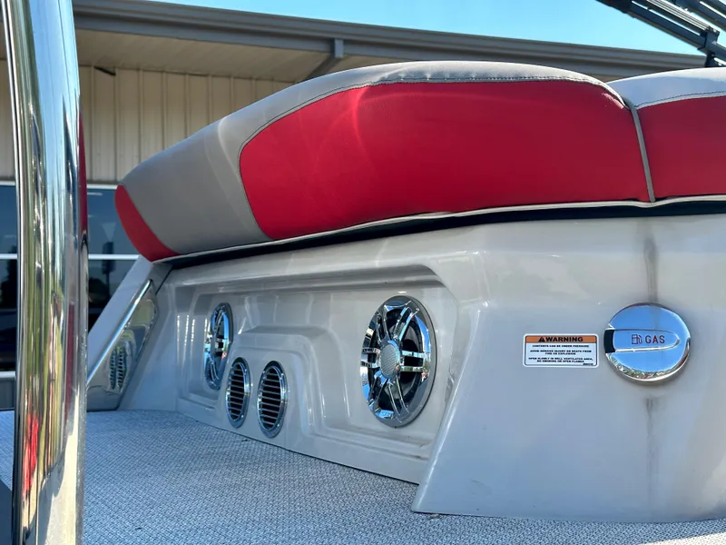 Slide: The Image of 2023 Tahoe Pontoon Cascade Versatile Rear Bench 25 FT Triple 25 SP, red and gray seating. - 8