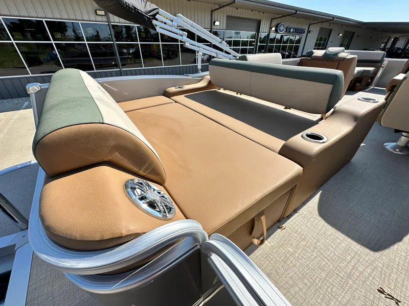 Slide: The Image of 2023 Tahoe Pontoon Cascade Versatile Rear Lounger with tan and green upholstery. - 24
