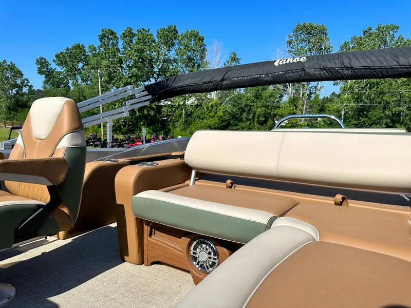 Slide: The Image of 2023 Tahoe Pontoon Cascade Versatile Rear Lounger with beige and green seating. - 25