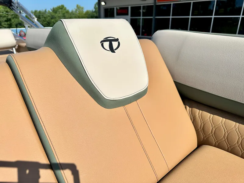 Slide: The Image of 2023 Tahoe Pontoon Cascade Versatile Rear Lounger, tan and cream upholstery, outdoor setting. - 31