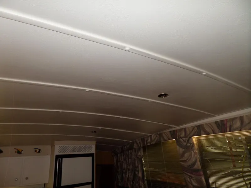 Slide: The Image of Interior ceiling of a 1978 Bertram 42 Flybridge Motor Yacht with curtains and blinds. - 40