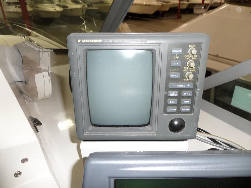 Slide: The Image of Vintage Furuno radar display on 1978 Bertram 42 Flybridge Motor Yacht. - 45