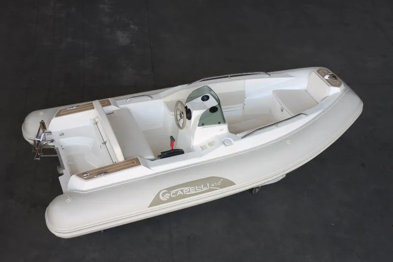 Slide: The Image of 2023 Capelli Tempest 410 Yacht Tender, sleek design, white hull, modern interior. - 3
