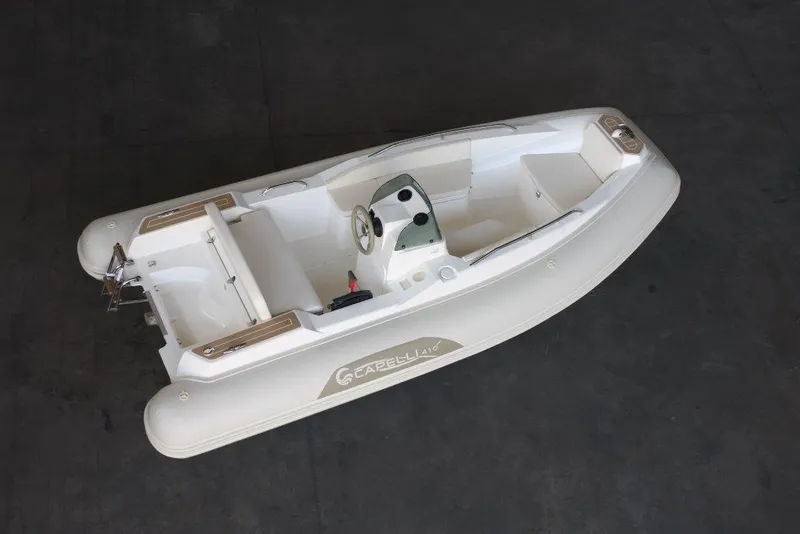Slide: The Image of 2023 Capelli Tempest 410 Yacht Tender, sleek white design, top view. - 5