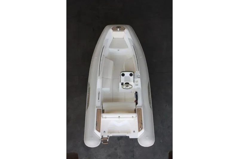 Slide: The Image of 2023 Capelli Tempest 410 Yacht Tender, top view, sleek white design. - 6