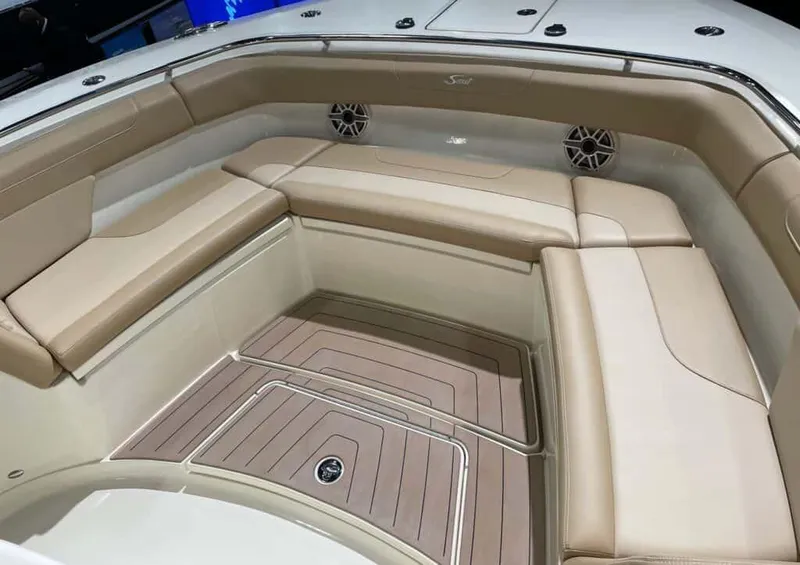 Slide: The Image of Luxurious seating area on the 2025 Scout 400 LXF boat model. - 19