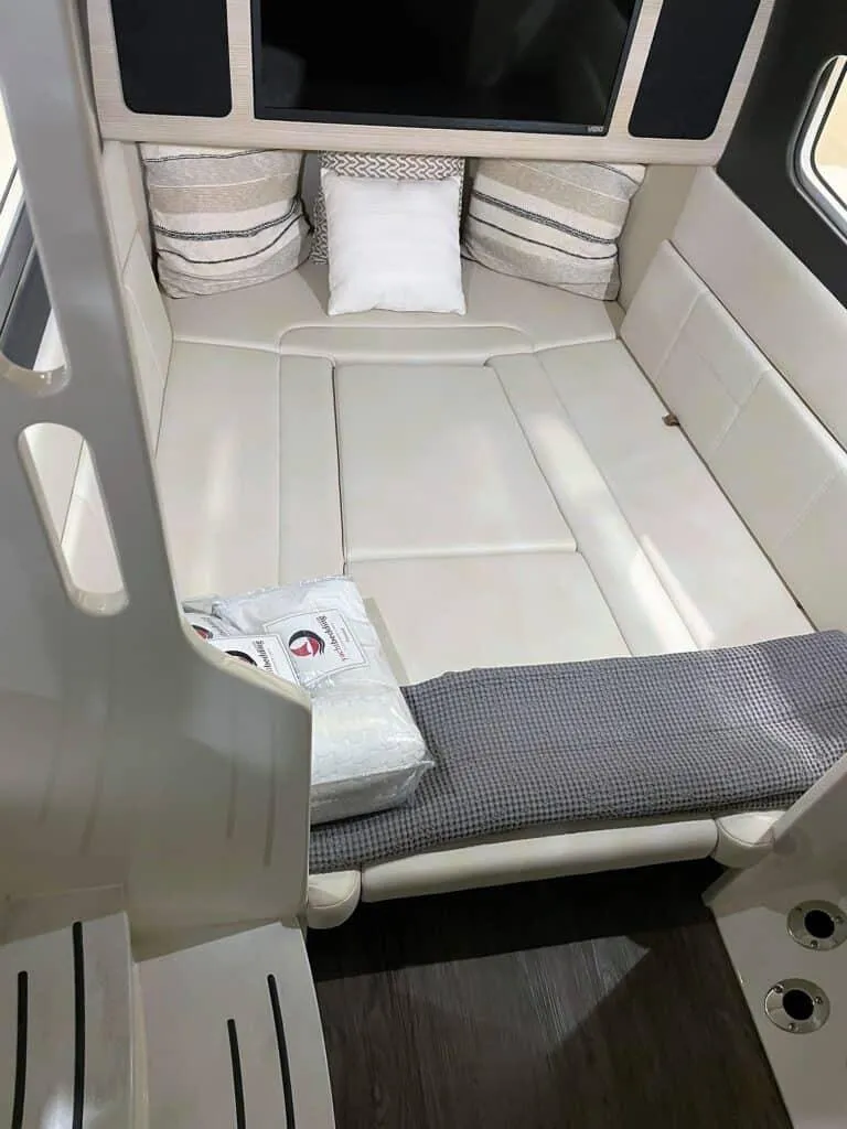 Slide: The Image of Luxurious cabin interior of 2025 Scout 400 LXF with comfortable bedding and modern design. - 24