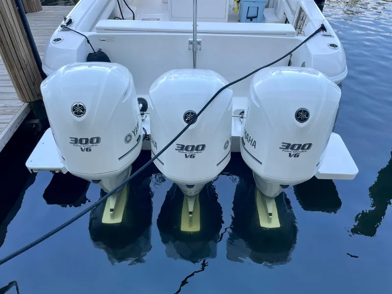 Slide: The Image of 2015 Intrepid 375 Walkaround with triple Yamaha 300 V6 outboard engines. - 28