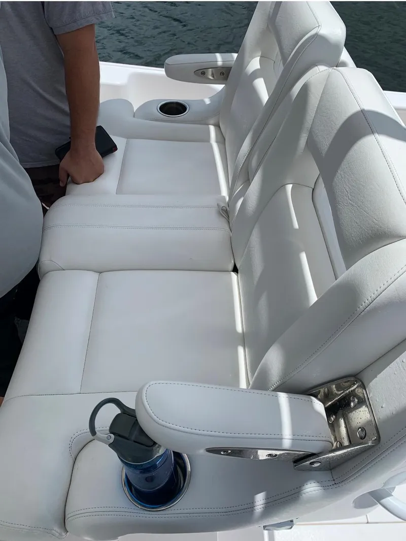 Slide: The Image of 2015 Intrepid 375 Walkaround boat with white leather seating. - 8