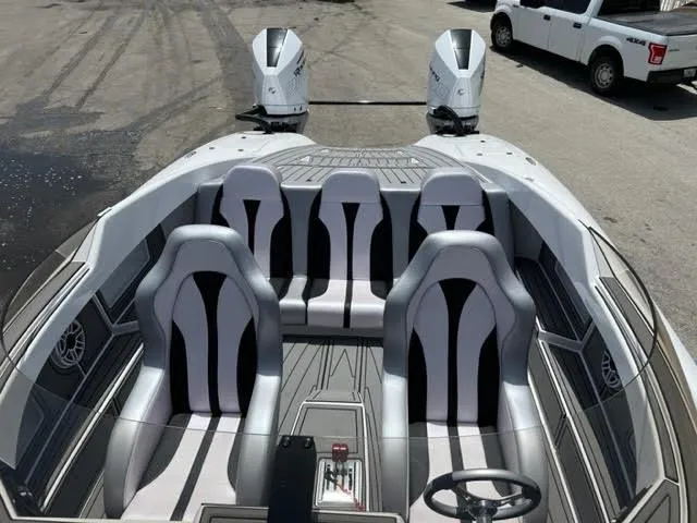 Slide: The Image of 2022 Doug Wright 32 Pleasure Cat interior with dual outboard engines. - 4