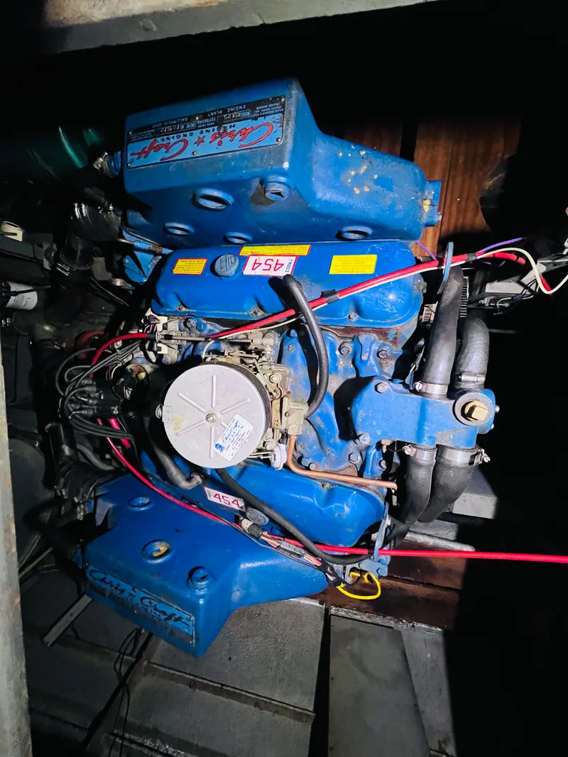 Slide: The Image of 1962 Chris-Craft Roamer engine, blue with visible wiring and components. - 17