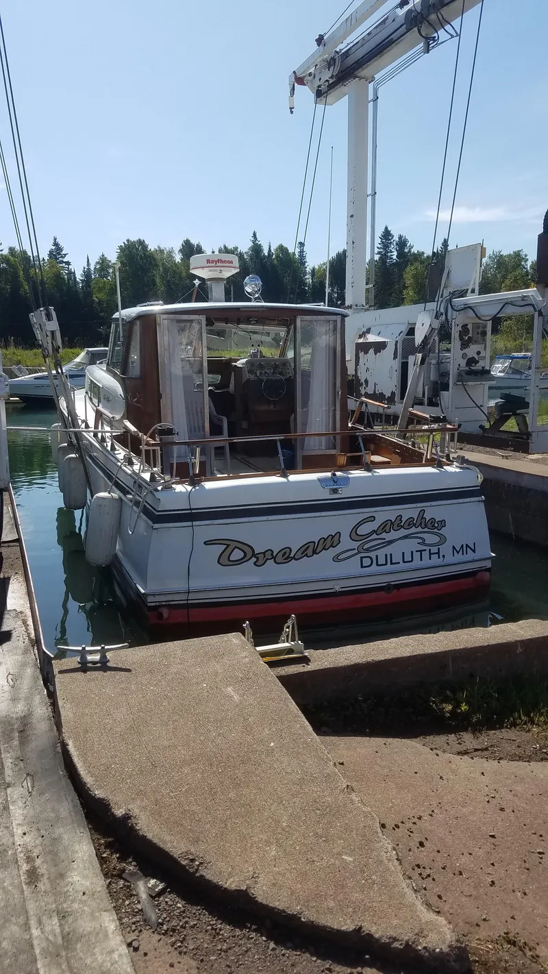 Slide: The Image of 1962 Chris-Craft Roamer boat docked in Duluth, MN, named "Dream Catcher." - 2