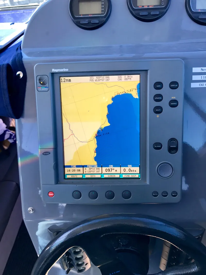 Slide: The Image of Navigation system on 2003 Protector Targa 28 boat dashboard. - 21