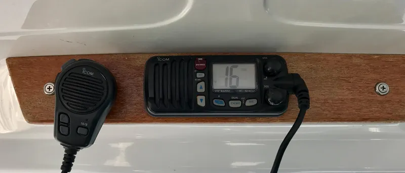Slide: The Image of Boat radio system on a 2003 Protector Targa 28, channel 16 displayed. - 25
