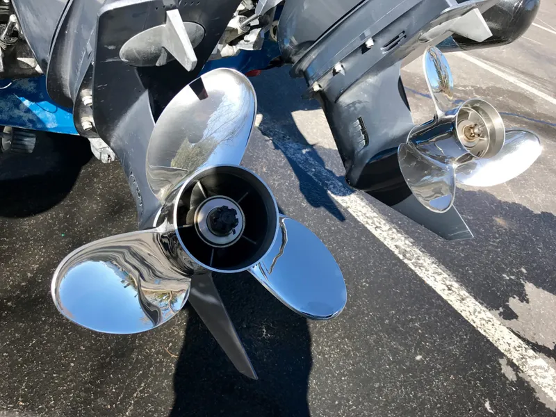 Slide: The Image of Close-up of shiny boat propellers on a 2003 Protector Targa 28. - 34