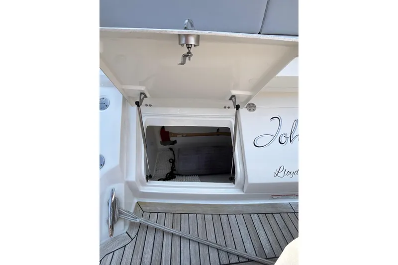 Slide: The Image of Open storage compartment on 2018 Sea Ray Sundancer 510 yacht deck. - 144