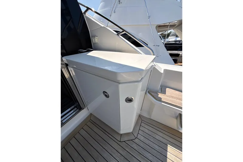 Slide: The Image of 2018 Sea Ray Sundancer 510 yacht deck with sleek cabinetry and modern design. - 111