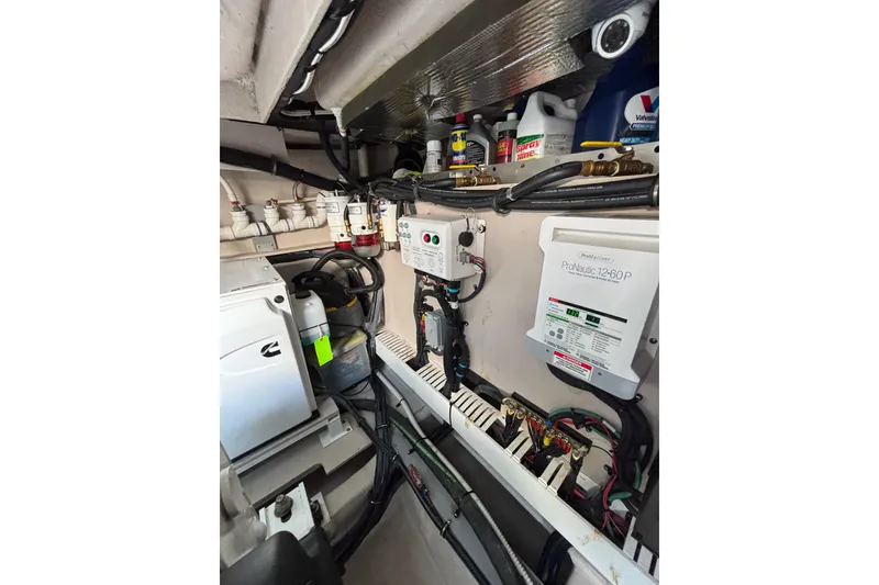 Slide: The Image of Engine room of 2018 Sea Ray Sundancer 510 with electrical systems and components. - 125