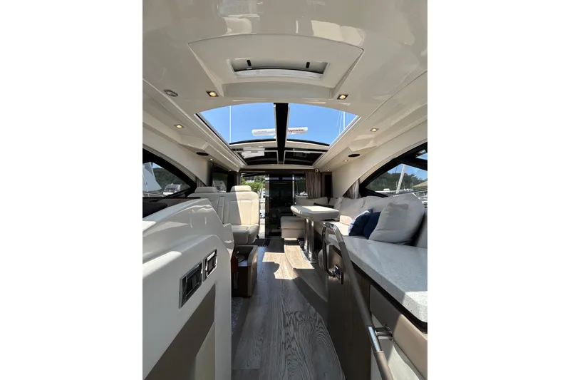 Slide: The Image of Luxurious interior of 2018 Sea Ray Sundancer 510 yacht with modern furnishings. - 96