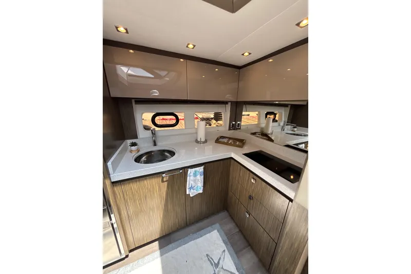 Slide: The Image of Luxurious kitchen interior of 2018 Sea Ray Sundancer 510 yacht with modern amenities. - 134